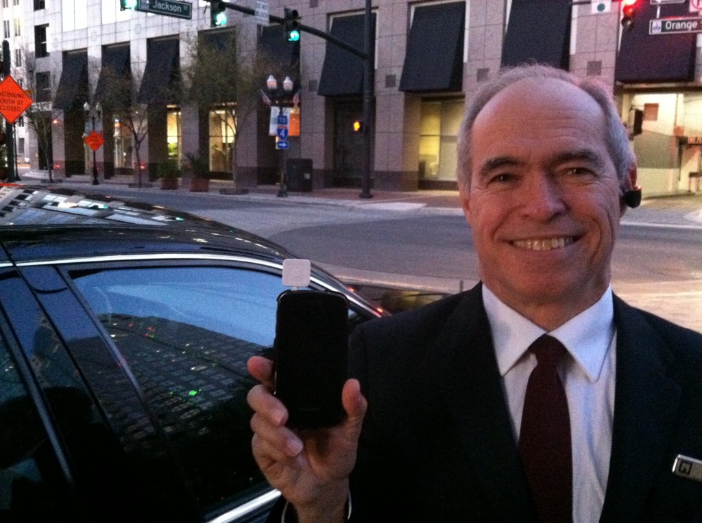 Orlando based chauffeur Rick Henry displays his mobile office