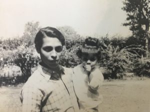 Shonali being held by dad as a baby