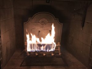 warming fire in fireplace